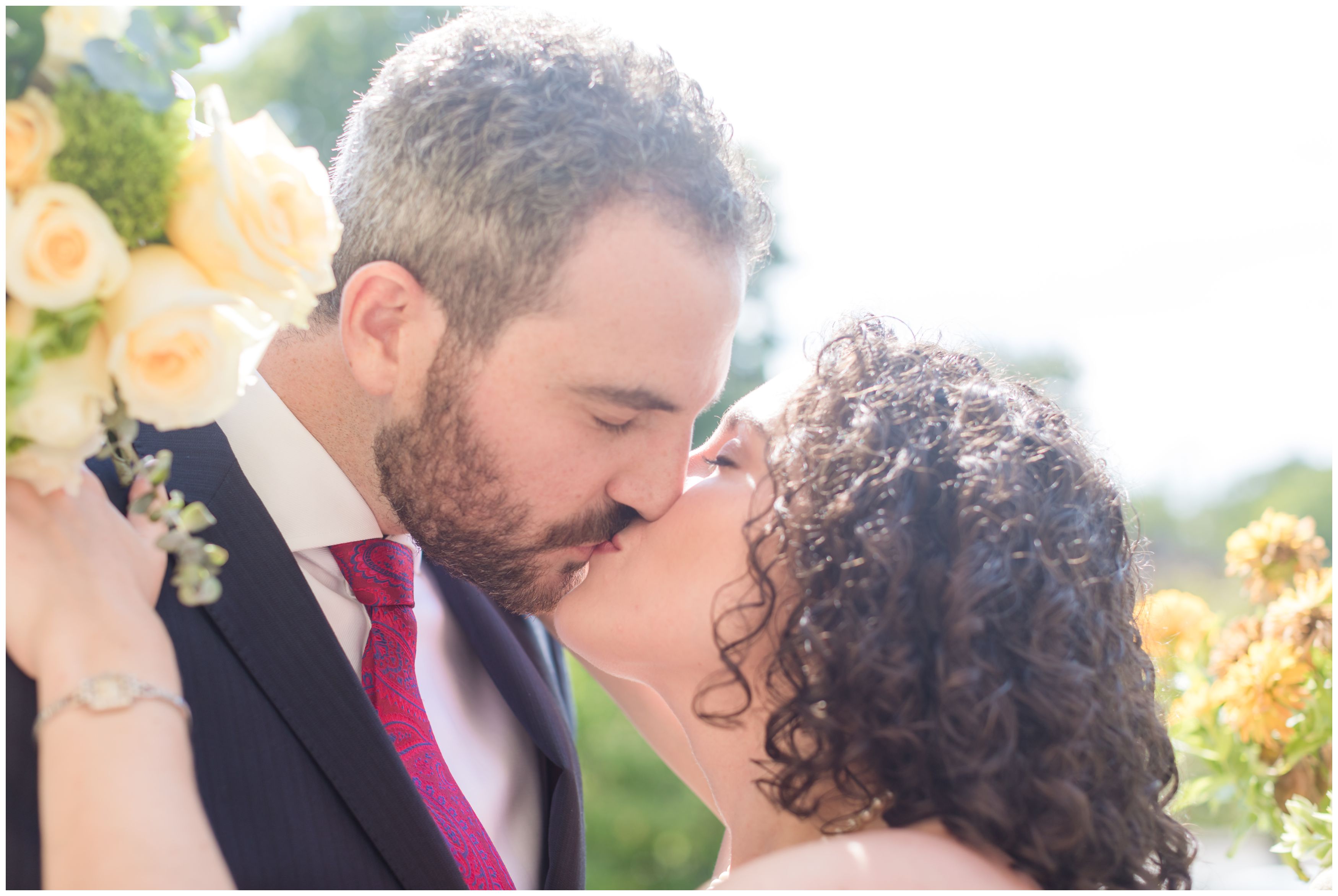 Bride and groom kiss at the Bernards Inn