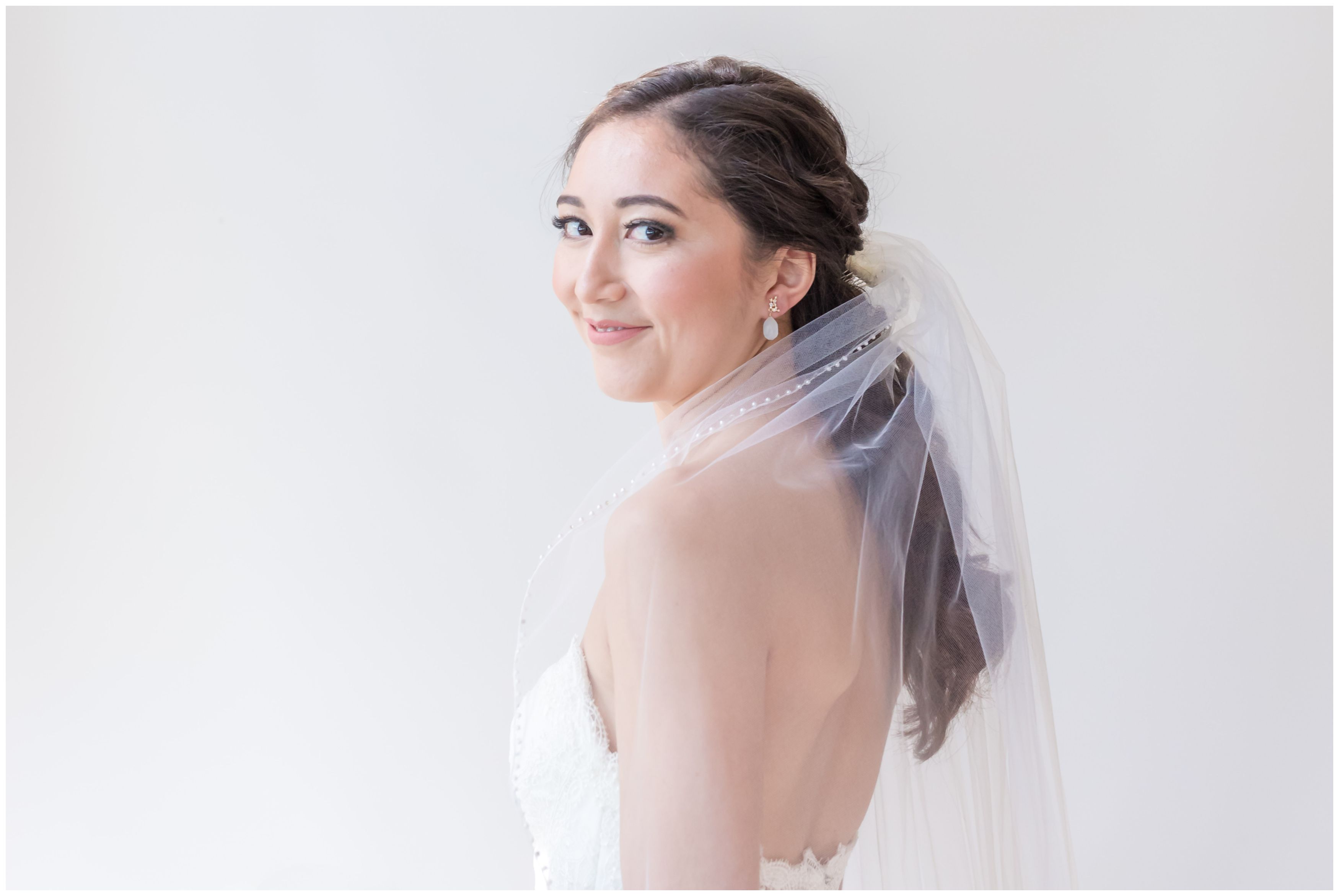 Classic bridal portrait with veil at Indian Trail Club