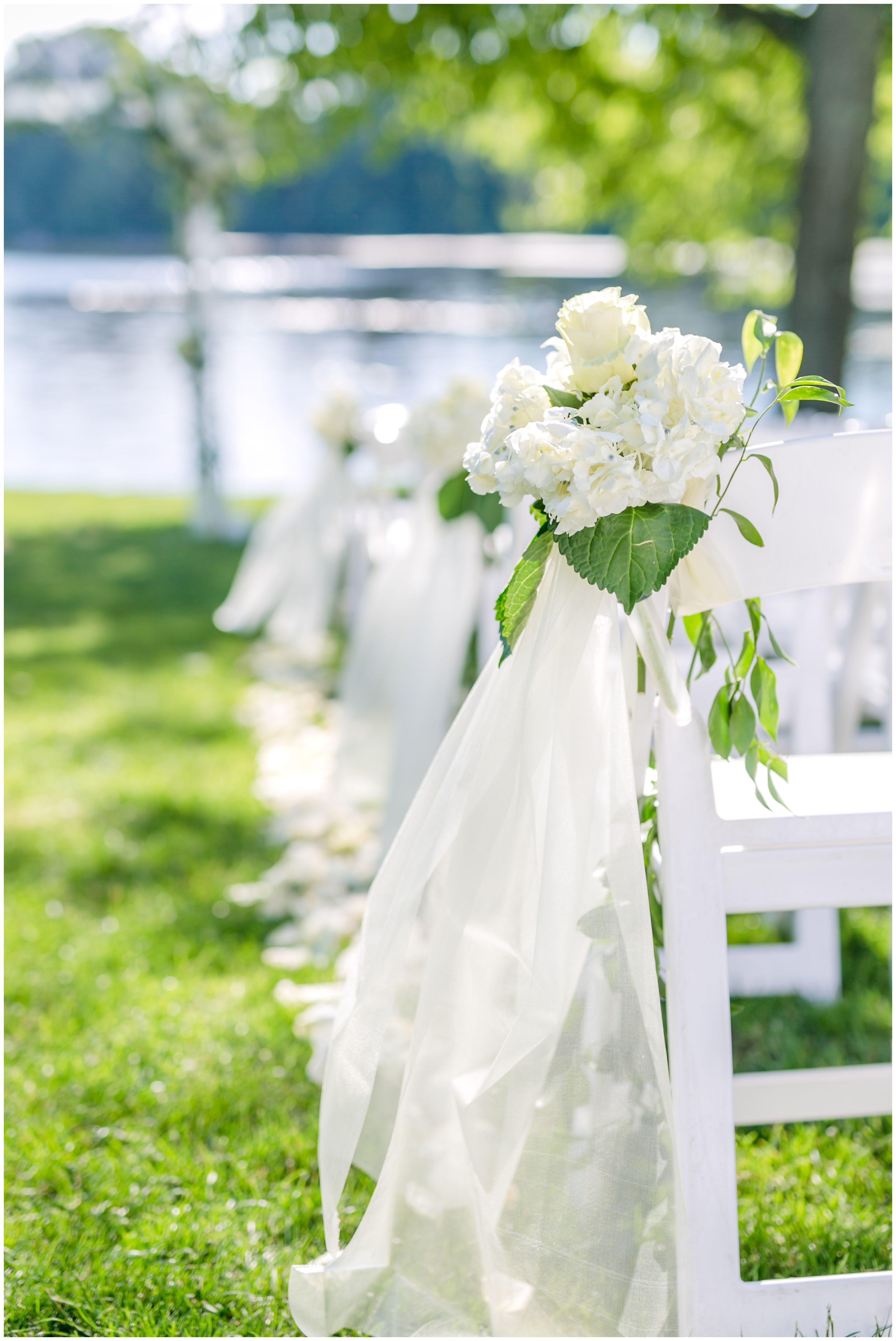 White hydrangea detail outdoor ceremony lakeside
