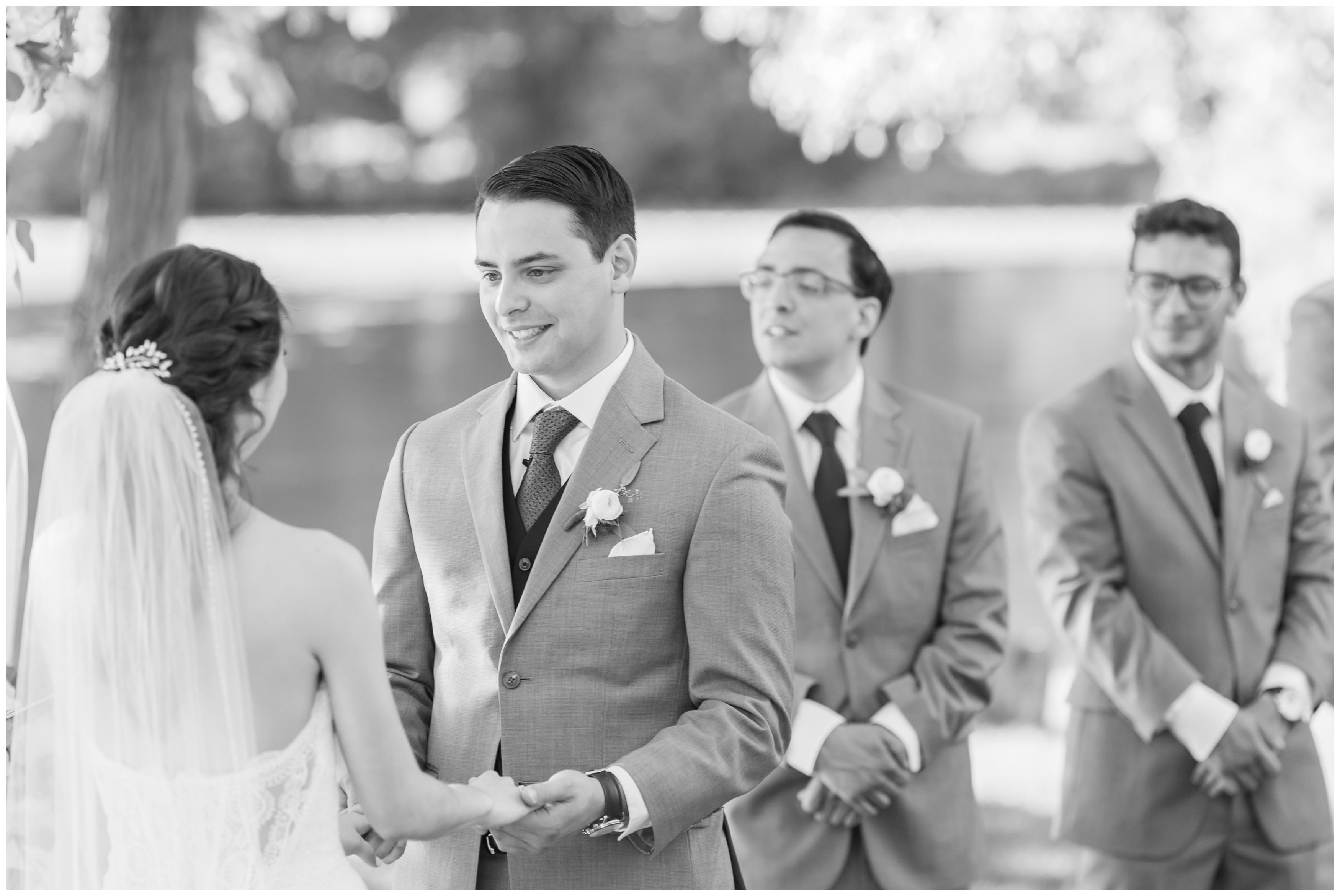 Black and white outdoor lakeside ceremony wedding