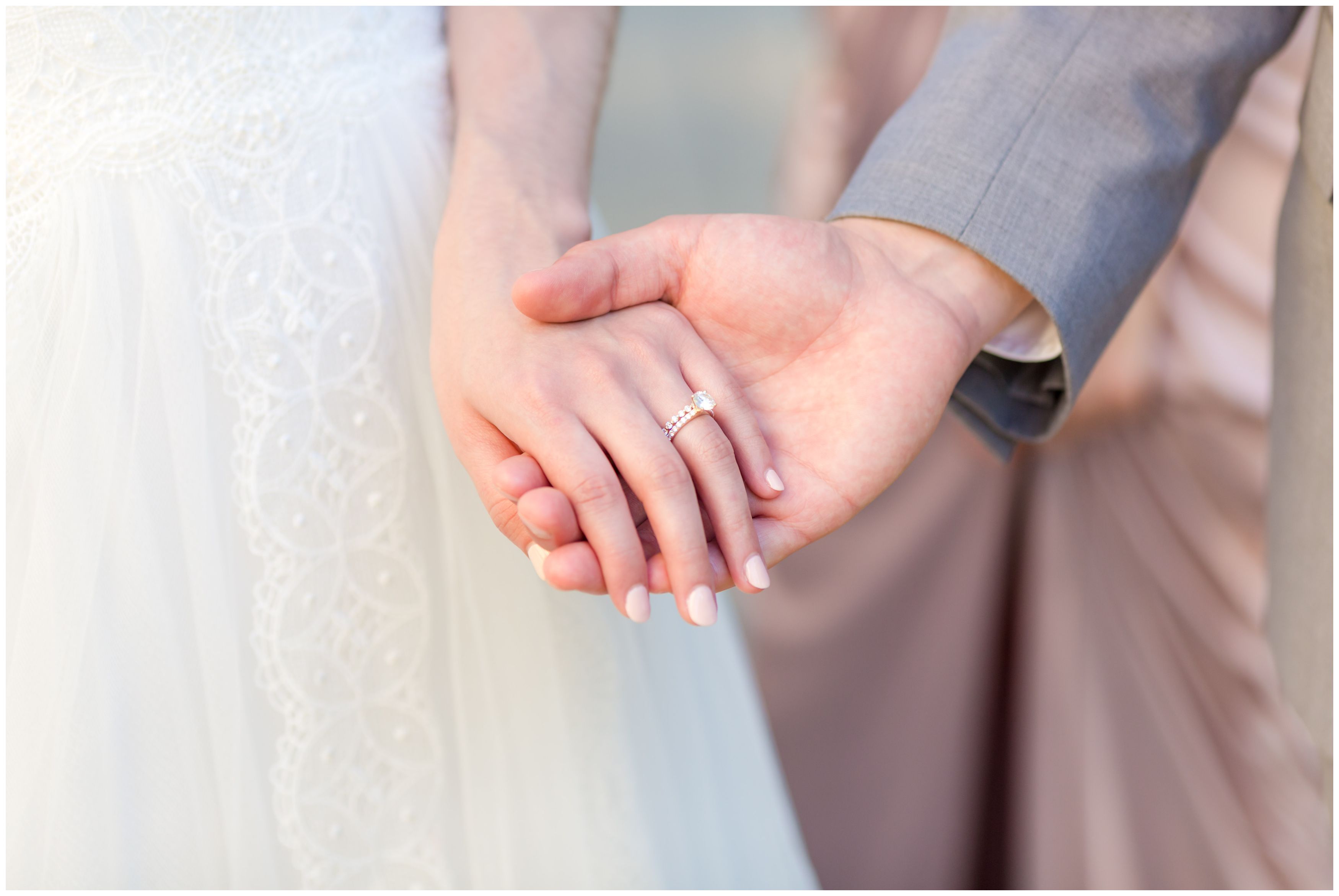Classic bride and groom wedding portrait hand in hand just married